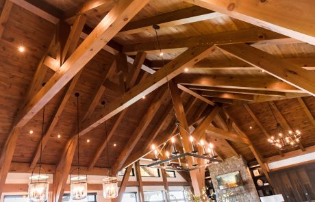 View of wood ceiling trusses and beams