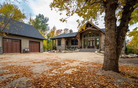 Home and two car garage exterior view in the Fall
