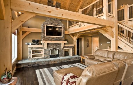Living room with stone fireplace