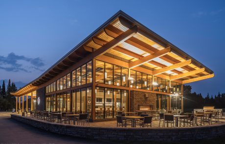 Golf course clubhouse exterior at night
